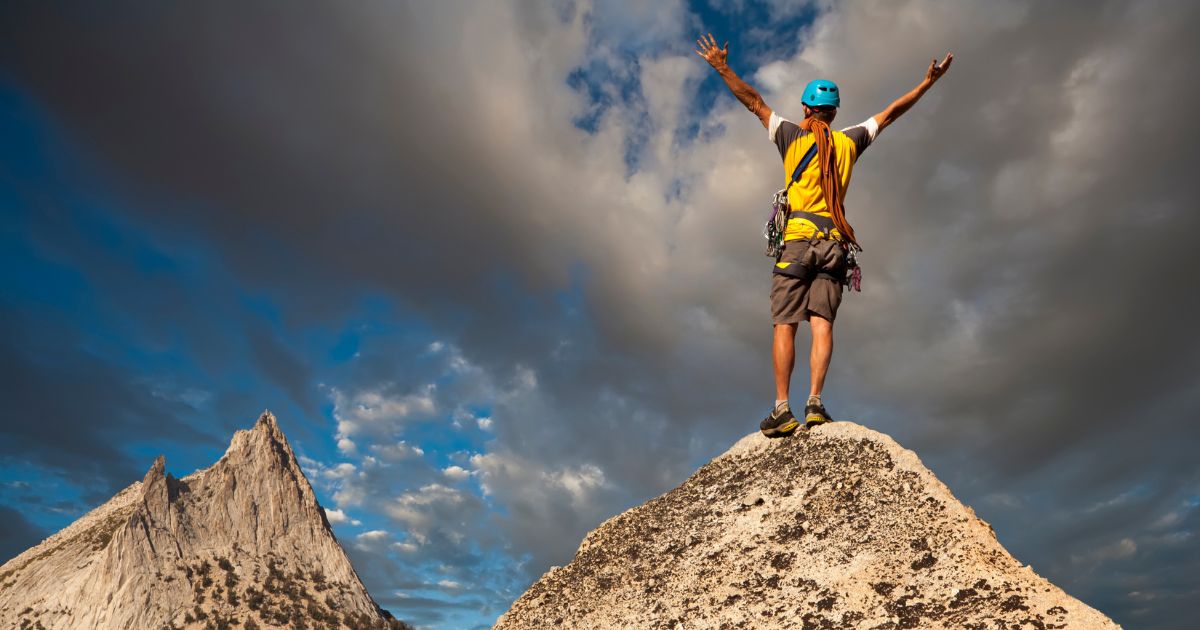 Man on the top of a mountain